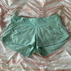 size 4 mint green lululemon shorts